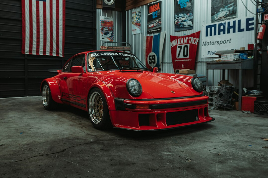 Car in a bright auto body workshop
