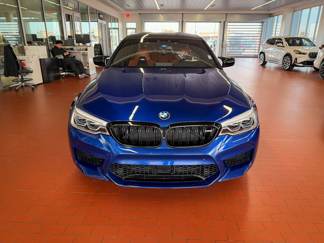 Blue sports car front view